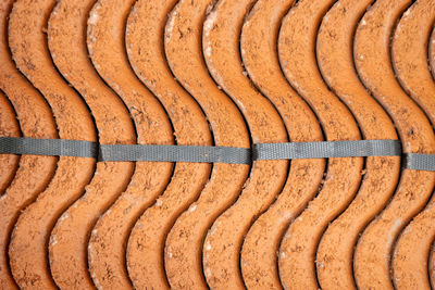 Full frame shot of ceramic roof tiles 