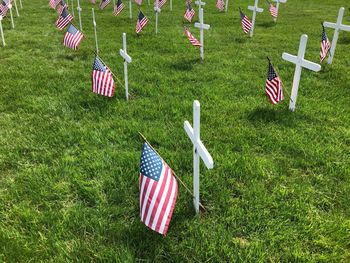 High angle view of flags on field