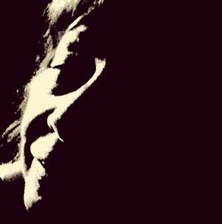 Close-up of over black background