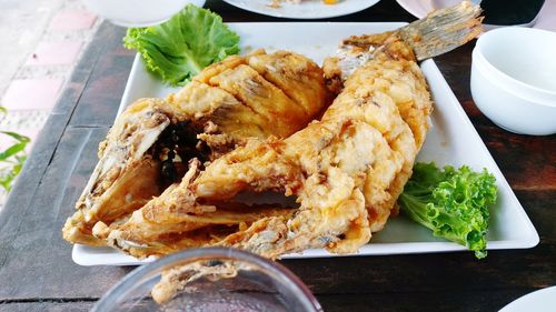 Close-up of food served on table