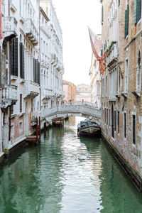 View of white bridge over canal, venice, italy