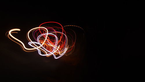 Light painting against black background