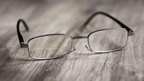 Close-up of eyeglasses on table