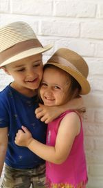 Portrait of a smiling girl wearing hat