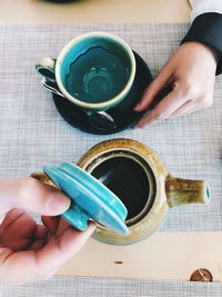 High angle view of coffee cup on table