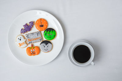 Directly above shot of coffee cups on table