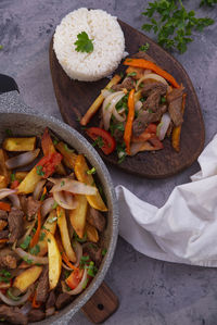 Peruvian dish known by the name of lomo saltado,.