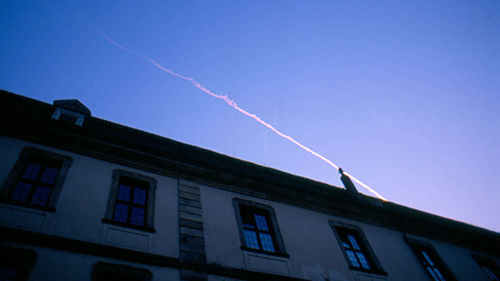 Low angle view of building against blue sky