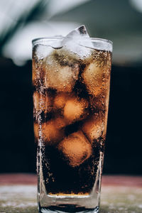 Close-up of ice cream in glass on table