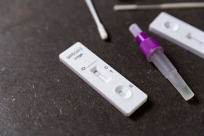 High angle view of thermometer on table