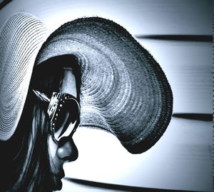 Close-up of man wearing hat