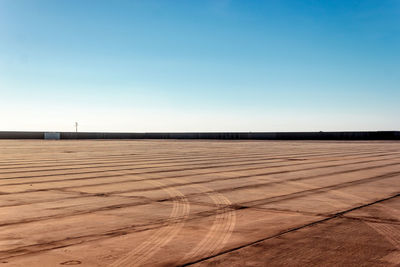 Scenic view of landscape against clear blue sky