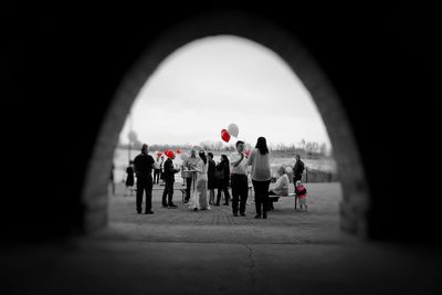 People walking in tunnel