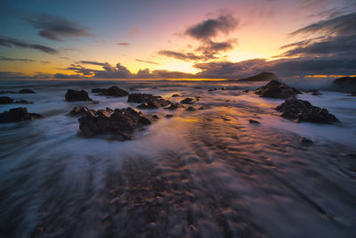 Scenic view of sea against sky during sunset