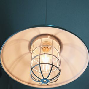 Low angle view of illuminated pendant light