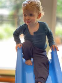 Portrait of cute girl playing in playground