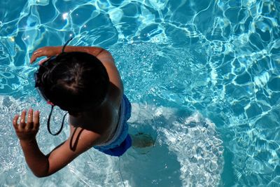 High angle view of man in swimming pool