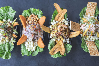 Variety of typical peruvian and mexican dishes. different types of eviction with marinated fish 