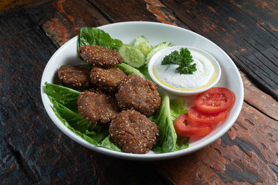 High angle view of meal served on table