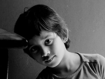 Portrait of girl on wall