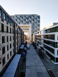 View of buildings in city against clear sky