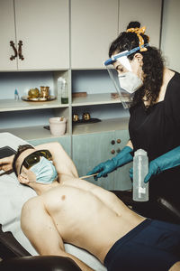 Woman sitting on floor