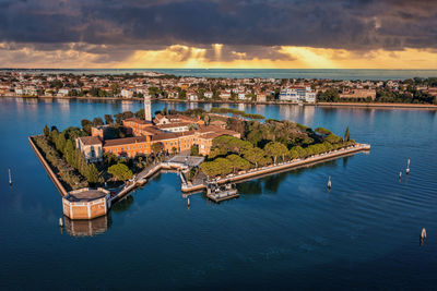 Flying over small venice islands in venetian lagoon.