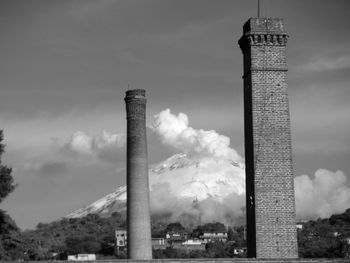 Smoke stack against sky