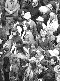 High angle view of people standing on street