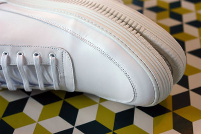 Close-up of pair of white shoes