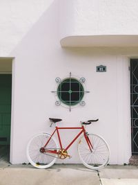 Red bicycle with white tires 