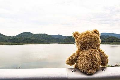 Scenic view of lake against mountain range