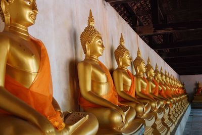 Buddha statue in temple outside building