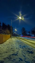 Illuminated street light at night