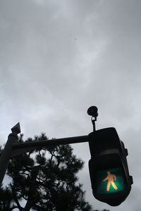 Low angle view of street light against sky