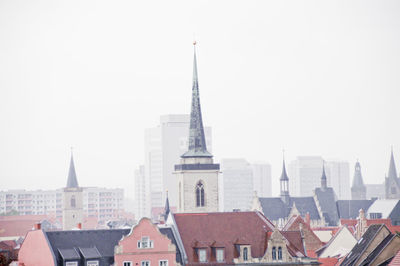 View of cityscape against clear sky