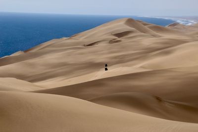 Scenic view of desert against sky