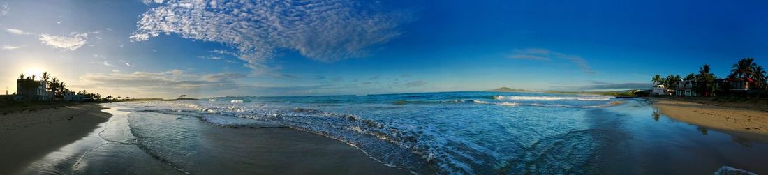 Panoramic view of beach against sky