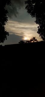 Scenic view of silhouette landscape against sky during sunset