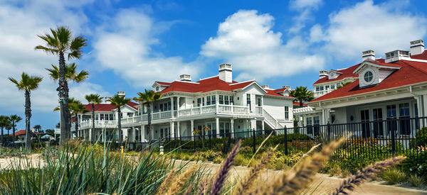 Street shot of a homes luxury homes in the island of coronado, california.