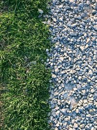 High angle view of stones on field