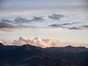 Scenic view of mountains against sky during sunset