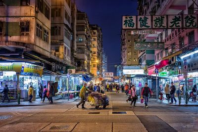 People at city market at night