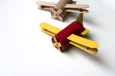 High angle view of toy on table against white background