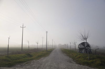 Road passing through field