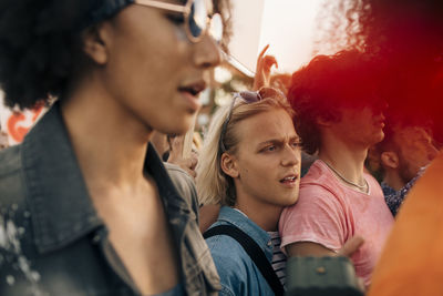 Men protesting while marching in city