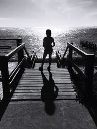 Pier on sea against sky