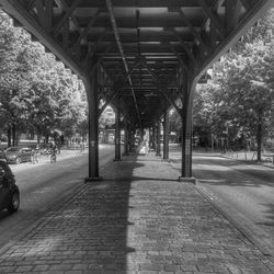 Empty road below bridge