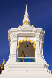 Low angle view of statue in bell tower