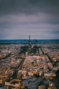 Distant view of eiffel tower amidst cityscape